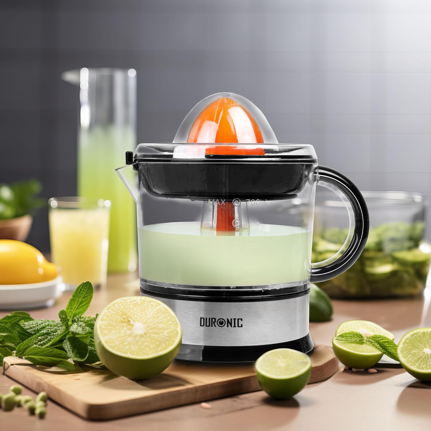 DURONIC JE407 spremiagrumi elettrico con le diverse parti del prodotto e lime fresco.